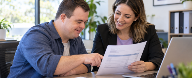 NDIS participant and plan manager reviewing a provider invoice together